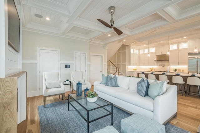 2045 W Ave, Ocean City, NJ 08226 - living area with coffered ceiling, stairs, crown molding, ceiling fan, and beamed ceiling