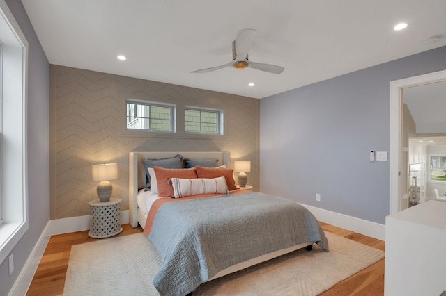 2045 W Ave, Ocean City, NJ 08226 - bedroom with an accent wall, baseboards, recessed lighting, ceiling fan, and light wood-type flooring