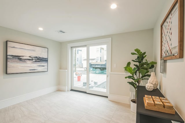 2045 W Ave, Ocean City, NJ 08226 - doorway to outside featuring baseboards, recessed lighting, and light tile patterned floors