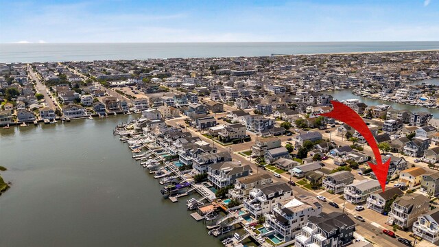 460 20th St Fl 2Nd, Avalon, NJ 08202 - aerial view of property and surrounding area featuring a large body of water and nearby suburban area