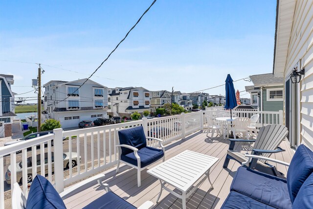 460 20th St Fl 2Nd, Avalon, NJ 08202 - deck with outdoor dining area and a residential view