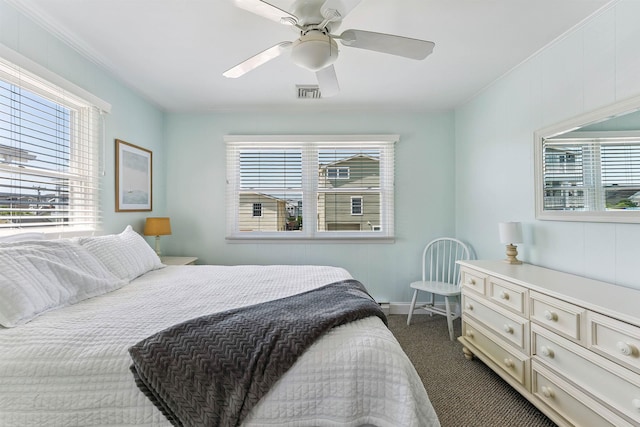 460 20th St Fl 2Nd, Avalon, NJ 08202 - bedroom with multiple windows, dark carpet, and a ceiling fan
