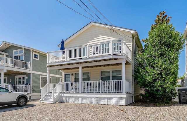 460 20th St Fl 2Nd, Avalon, NJ 08202 - view of front facade with a porch