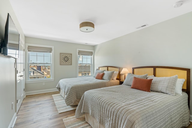 bedroom featuring light hardwood / wood-style flooring