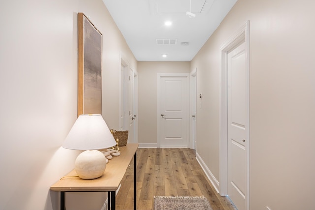 hall with light wood-type flooring