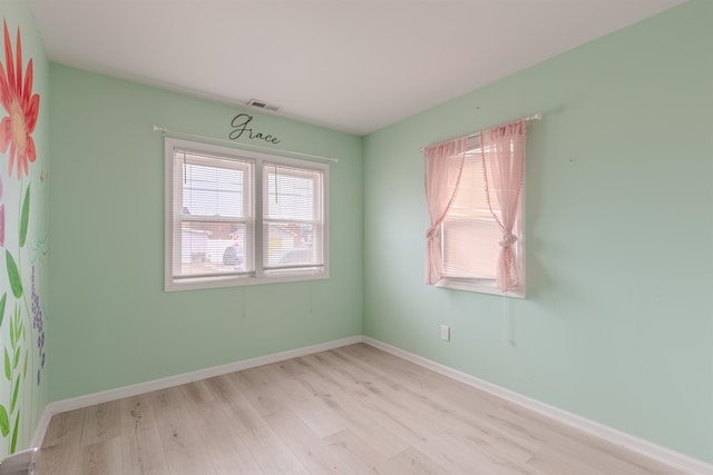 empty room featuring light hardwood / wood-style floors