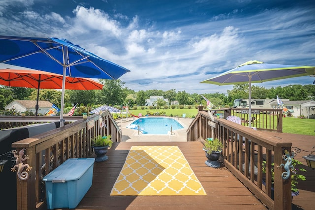 wooden deck with a yard