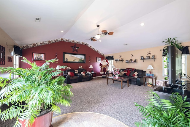 living room featuring carpet, plenty of natural light, ceiling fan, and vaulted ceiling