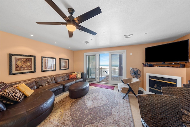 living room with ceiling fan