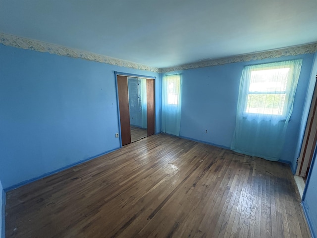 empty room featuring hardwood / wood-style floors