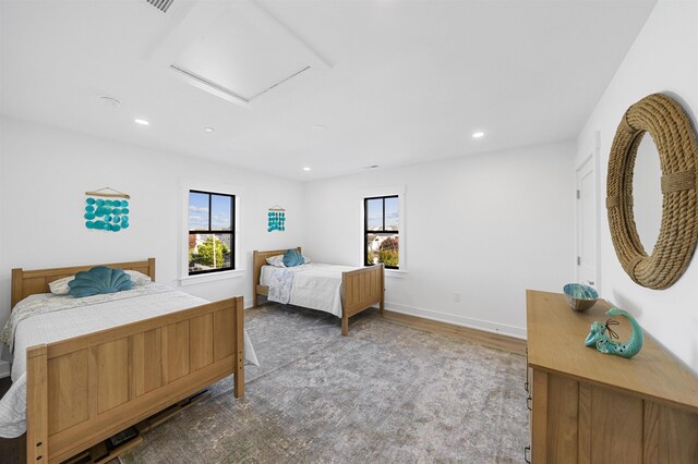 bedroom featuring wood-type flooring