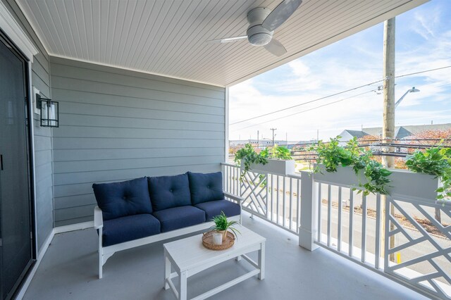 balcony with ceiling fan and an outdoor hangout area