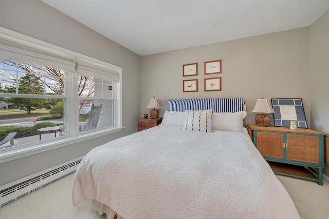 717 Third Ave, West Cape May, NJ 08204 - bedroom with a baseboard heating unit and carpet floors