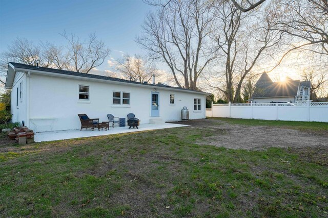 717 Third Ave, West Cape May, NJ 08204 - back of house featuring stucco siding, a patio area, and entry steps