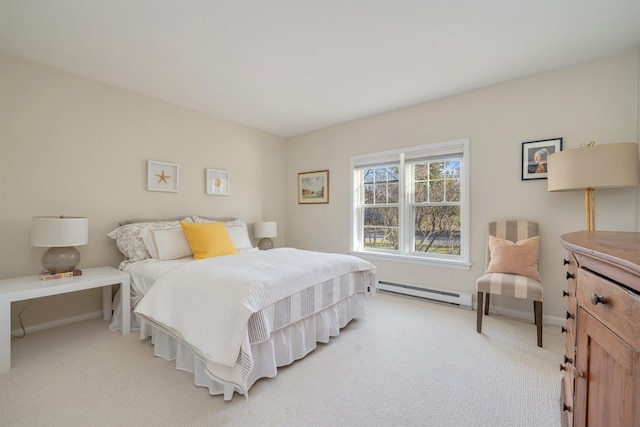 717 Third Ave, West Cape May, NJ 08204 - bedroom featuring baseboard heating and light carpet