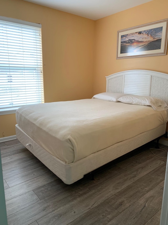 bedroom featuring dark hardwood / wood-style floors