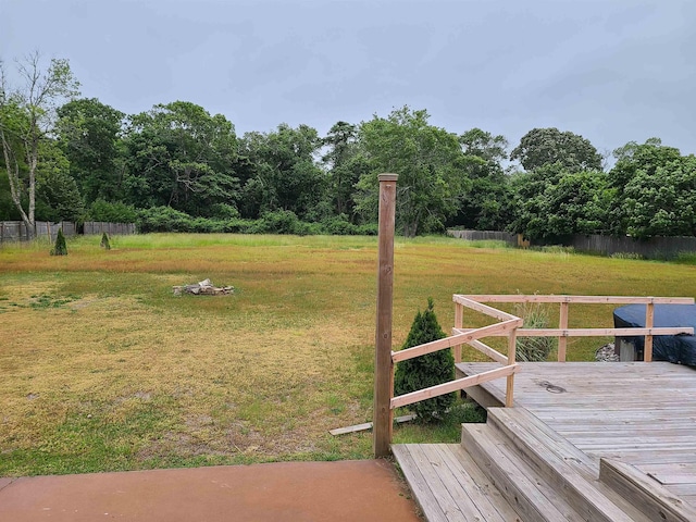 view of yard featuring a wooden deck