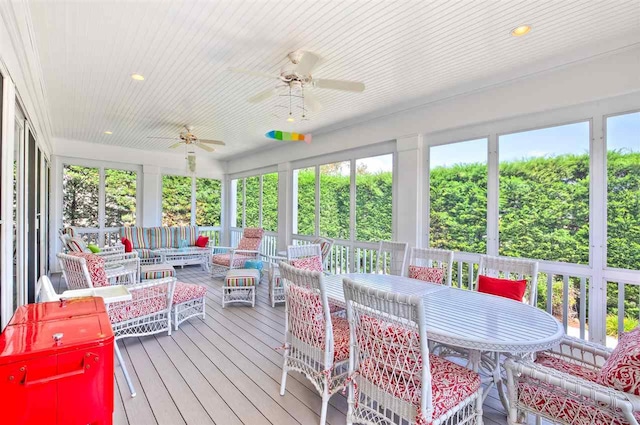 sunroom / solarium with ceiling fan