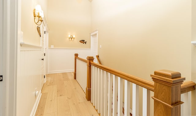 hall with light hardwood / wood-style floors