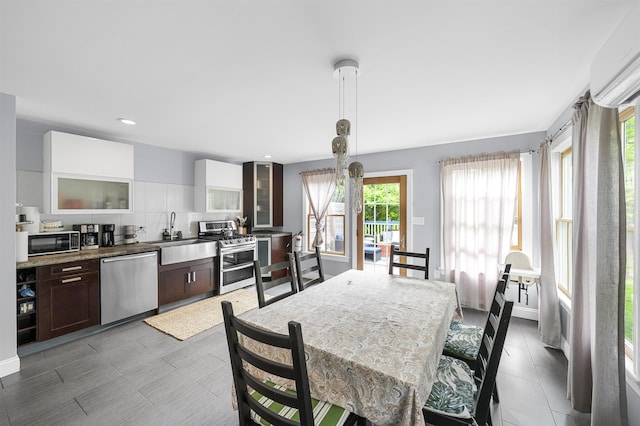 8281/2 Corgie St, Cape May, NJ 08204 - dining room with a wall mounted AC and recessed lighting
