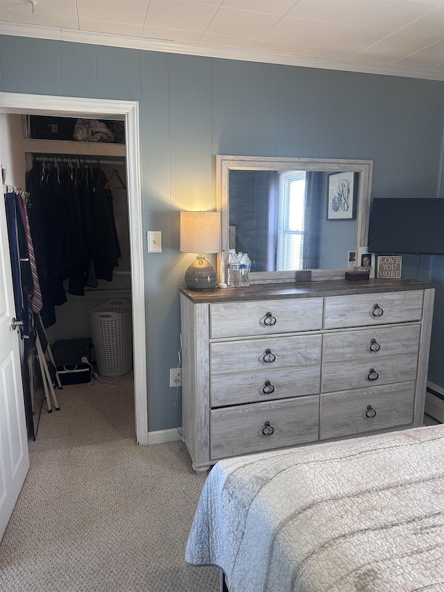 435 W Pine Ave, Wildwood, NJ 08260 - bedroom with a closet, light carpet, ornamental molding, and a walk in closet