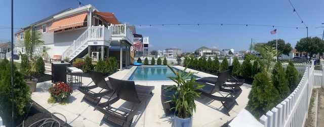 435 W Pine Ave, Wildwood, NJ 08260 - view of swimming pool featuring stairway, a patio, and fence