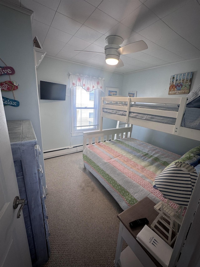 435 W Pine Ave, Wildwood, NJ 08260 - carpeted bedroom with baseboard heating and a ceiling fan