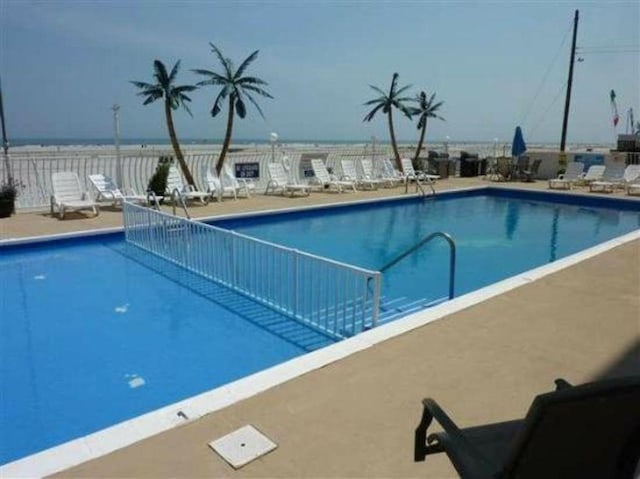 pool featuring a patio area