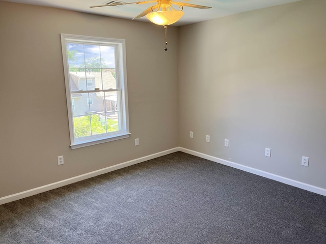 carpeted empty room with ceiling fan