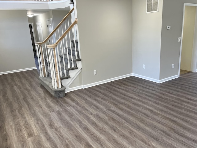 interior space with dark wood-type flooring