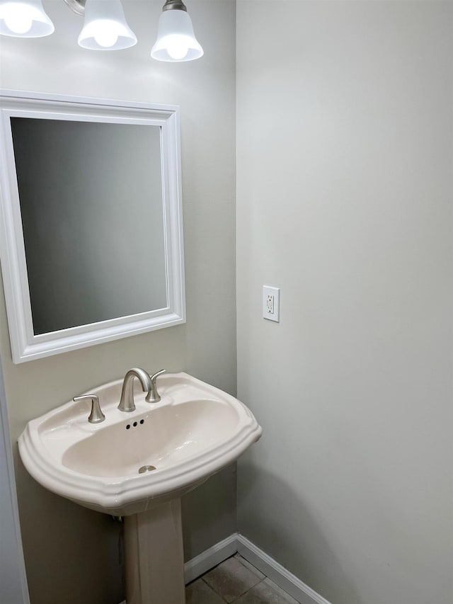 bathroom featuring tile patterned flooring