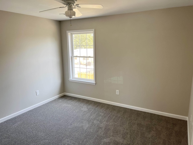 empty room with carpet flooring and ceiling fan