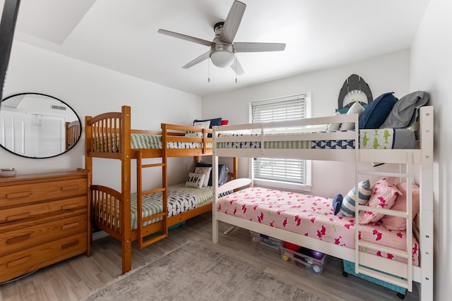 bedroom with wood finished floors