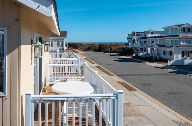 balcony featuring a residential view