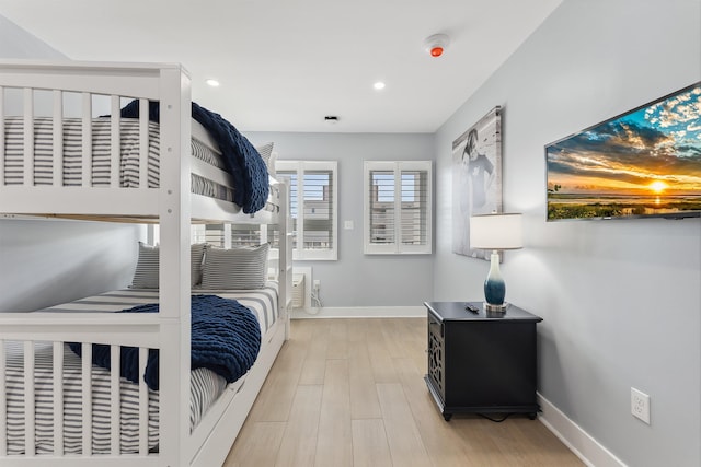 bedroom featuring light wood-type flooring