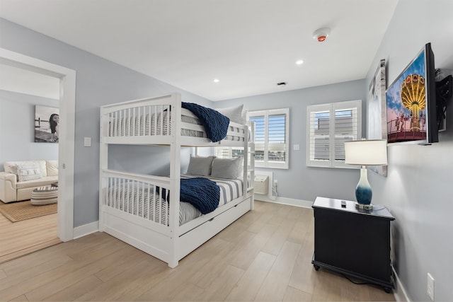 bedroom featuring light wood-type flooring