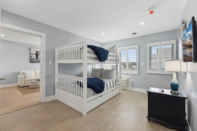 bedroom with light hardwood / wood-style floors