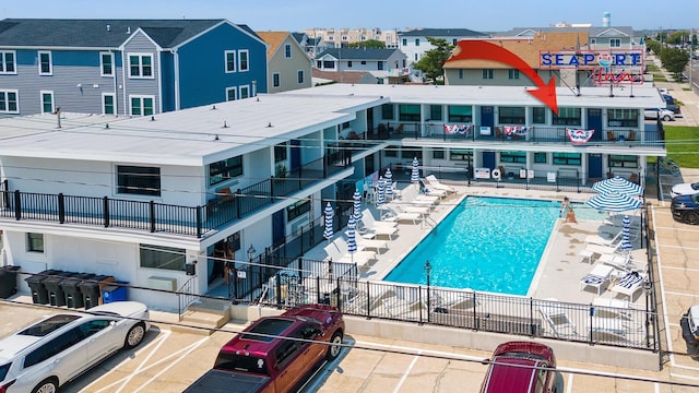 view of swimming pool featuring a patio area