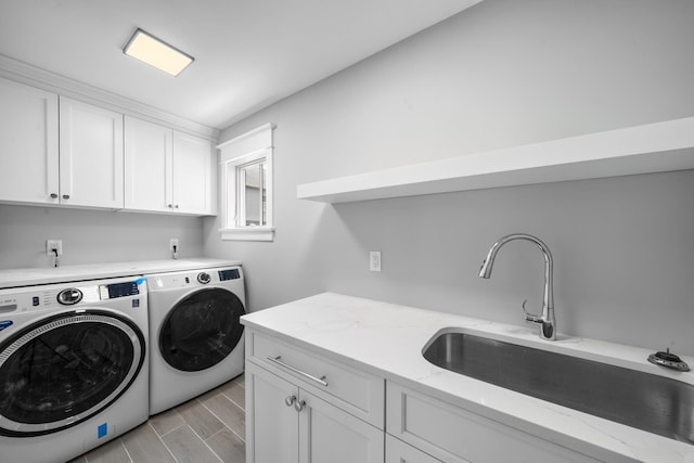 65 E 24th St, Avalon, NJ 08202 - laundry area featuring independent washer and dryer, cabinet space, and wood finish floors