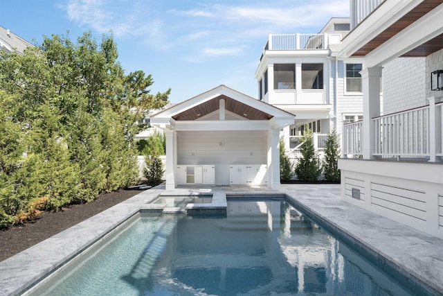 65 E 24th St, Avalon, NJ 08202 - view of swimming pool with a pool with connected hot tub and a patio area