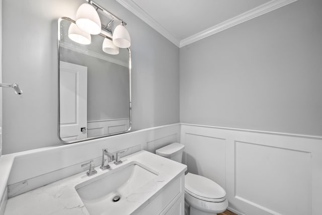 65 E 24th St, Avalon, NJ 08202 - bathroom with vanity, crown molding, and a wainscoted wall