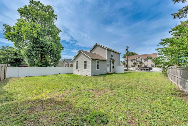 14 E New York Ave, Villas, NJ 08251 - rear view of house with a fenced backyard