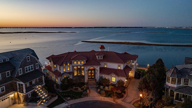 exterior space with a water view