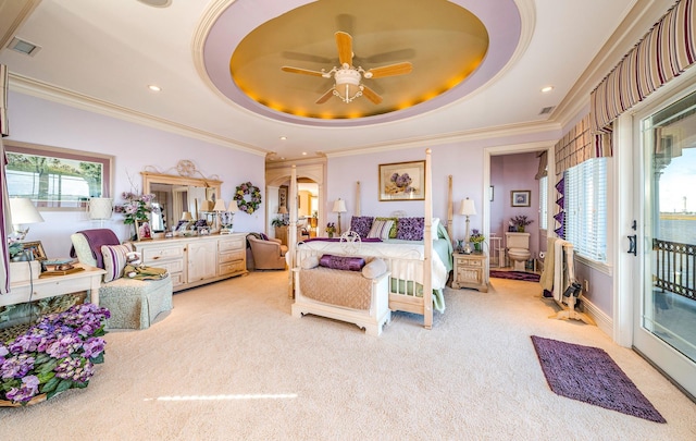 bedroom featuring a tray ceiling, access to exterior, ceiling fan, and light carpet