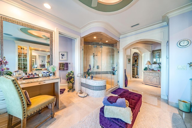 bathroom with ornamental molding, vanity, and a shower with shower door