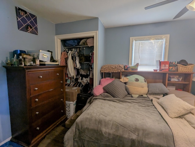 bedroom featuring a closet and a ceiling fan