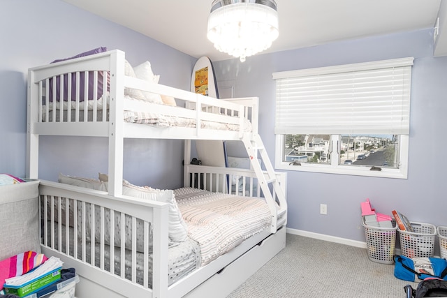 bedroom featuring an inviting chandelier