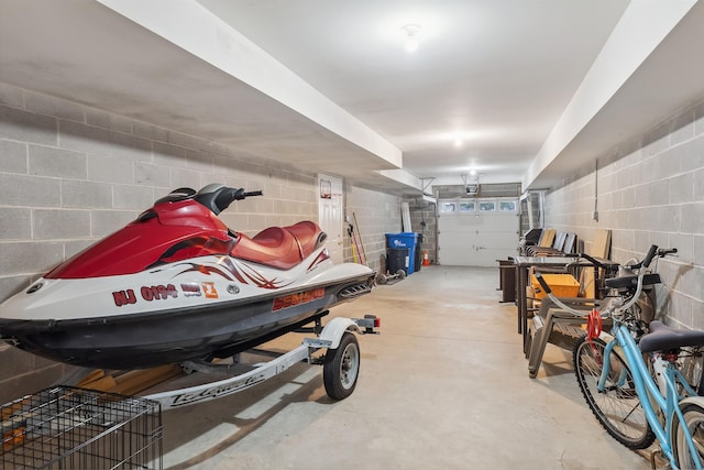 garage featuring concrete block wall