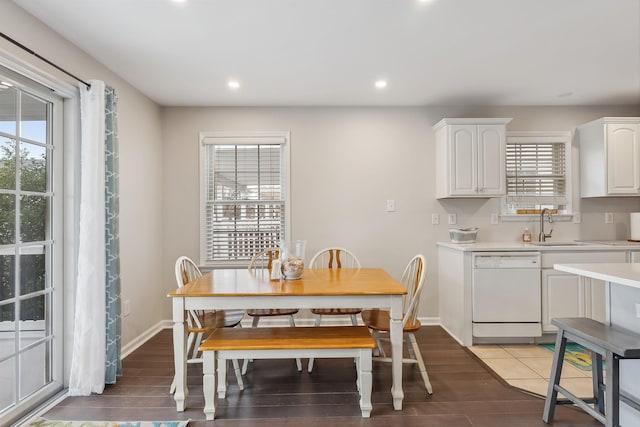 dining space featuring recessed lighting, light wood finished floors, and baseboards