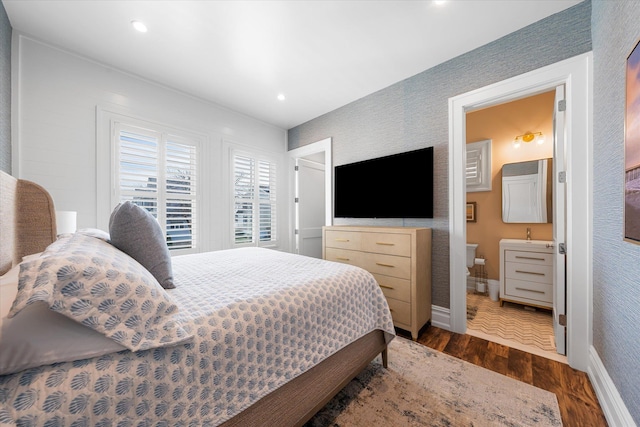 10017 Corinthian Dr, Stone Harbor, NJ 08247 - bedroom with ensuite bathroom, recessed lighting, baseboards, and wood finished floors